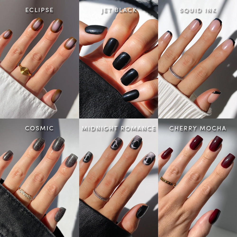 Six hands featuring Back in Black Squovals by glamnetic—displayed in gold-brown (Eclipse), matte black (Jet Black), pale pink with black tips (Squid Ink), sparkly gray (Cosmic), black with white letters (Midnight Romance), and deep red (Cherry Mocha)—showcase salon-quality manis in a stunning array of dark neutral nails. - Product image