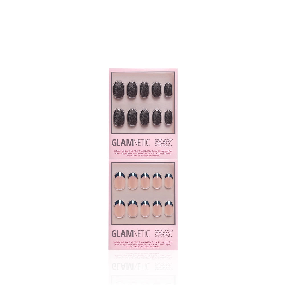 Two packs of glamnetic press-on nails; the top set is dark and glittery, while the bottom set is the "Black to Basics Ovals" style by glamnetic, featuring short round nails with a nude base and striking blue, white, and black French tips. Both sets are beautifully displayed in rectangular pink packaging. - Product image