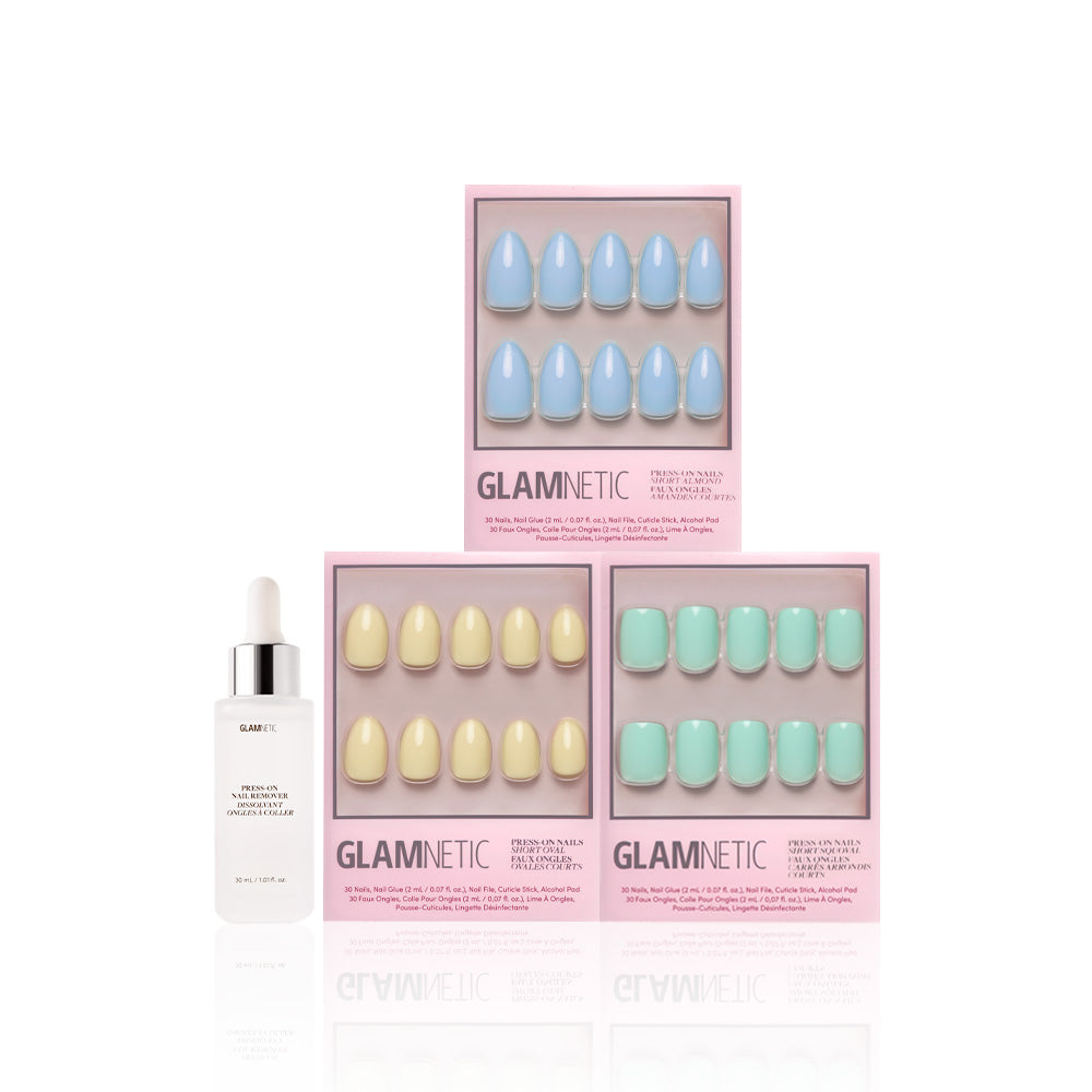 Three boxes of glamnetic Anns Palette press-on nails in pastel blue, yellow, and green with a glossy finish are displayed above a white bottle of glamnetic nail serum with a dropper, all set against a white background. - Product image