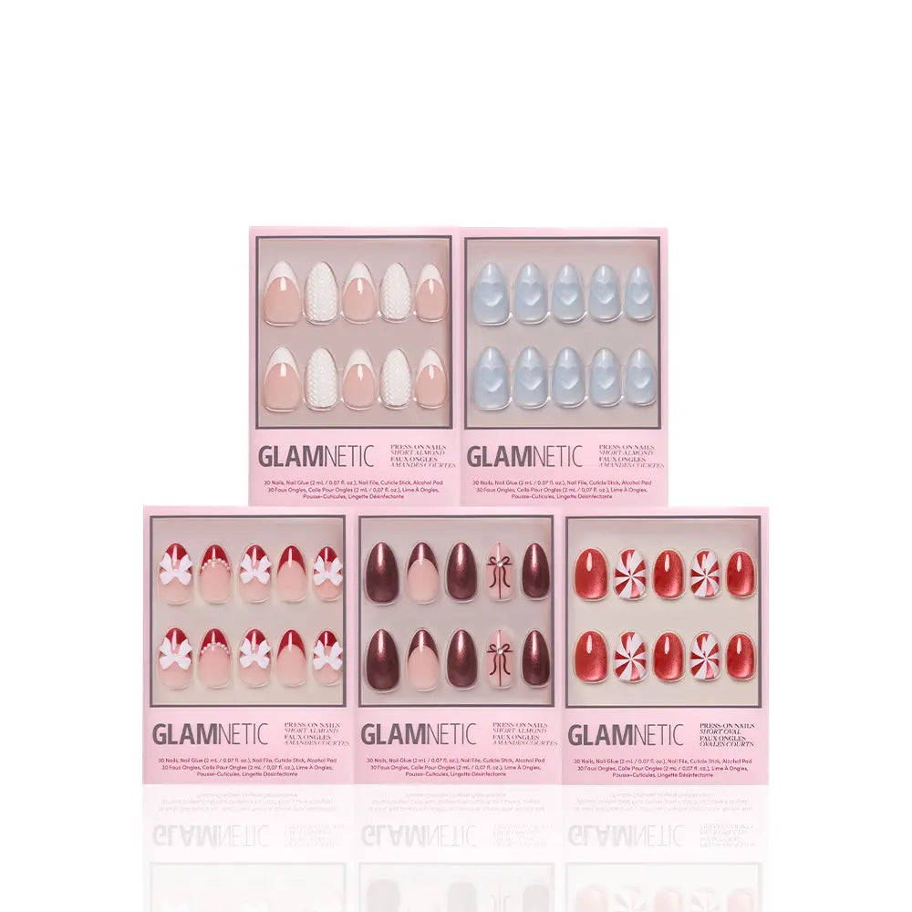 Ann’s Festive Five by glamnetic features five boxes of press-on nails in assorted designs and colors—nude, light blue, maroon, red with candy-inspired patterns—ideal for holiday or party manis, displayed against a white background. - Product image