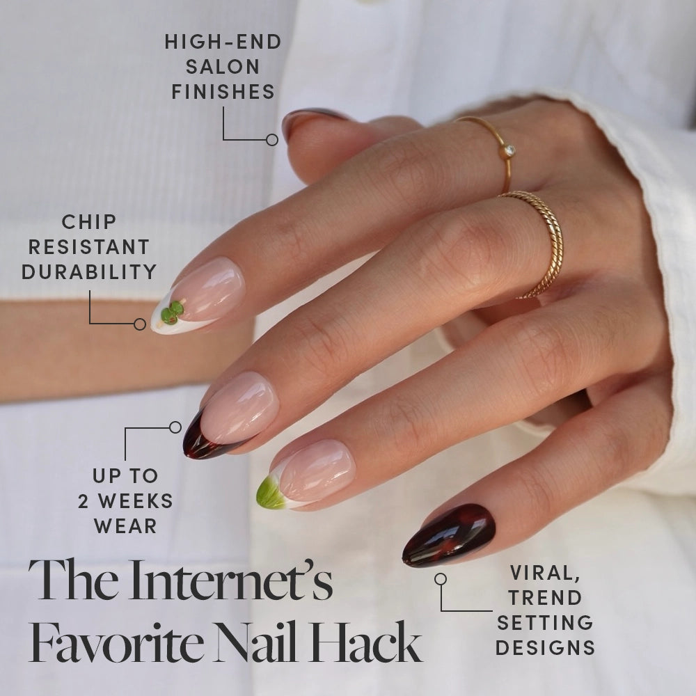 A manicured hand showcases glamnetic's Antipasto press-on nails with trendy brown tips, green accents, and 3D art, paired with text about salon-quality finish, chip resistance, two weeks' wear, and viral nail designs. - Product image