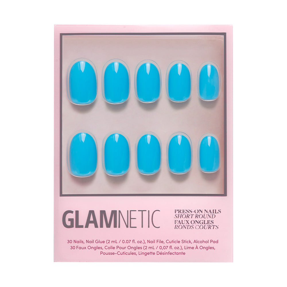 A box of glamnetic Azure Blue nails in a vibrant shade, featuring ten short, round press-ons on a pink backing. The packaging highlights long-lasting wear, perfect for summer fun. - Product image