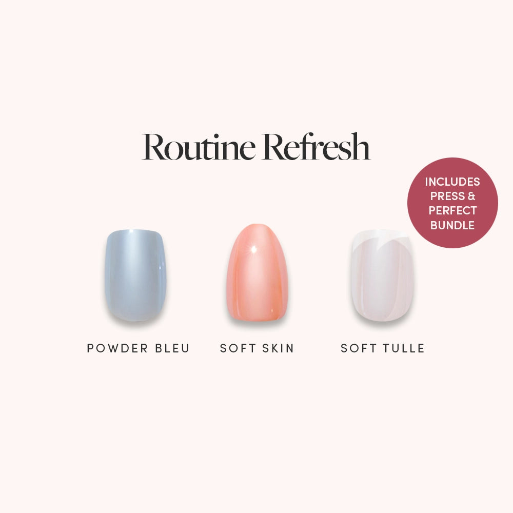 Three artificial nails from the glamnetic Routine Refresh Collection are featured in Powder Bleu (gray-blue), Soft Skin (peach-pink), and Soft Tulle (sheer white) shades. The text reads “Routine Refresh” and notes that the set includes the Press & Perfect Bundle. These premium press-on nails make at-home manicures easy—just use your favorite nail glue or nail remover for simple application and removal. - Product image