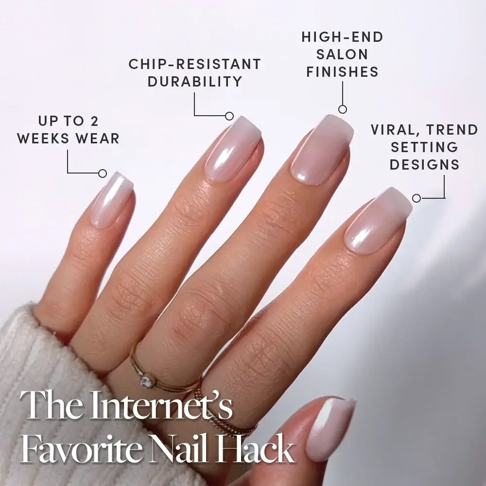Close-up of a hand with glossy, medium square glamnetic Bailey press-on nails in a pale pink shade. Descriptive text highlights long wear, chip resistance, high-end finishes, and trendy semi-transparent designs. The hand is styled with rings and a cream sweater. Text: The Internet’s Favorite Nail Hack. - Product image