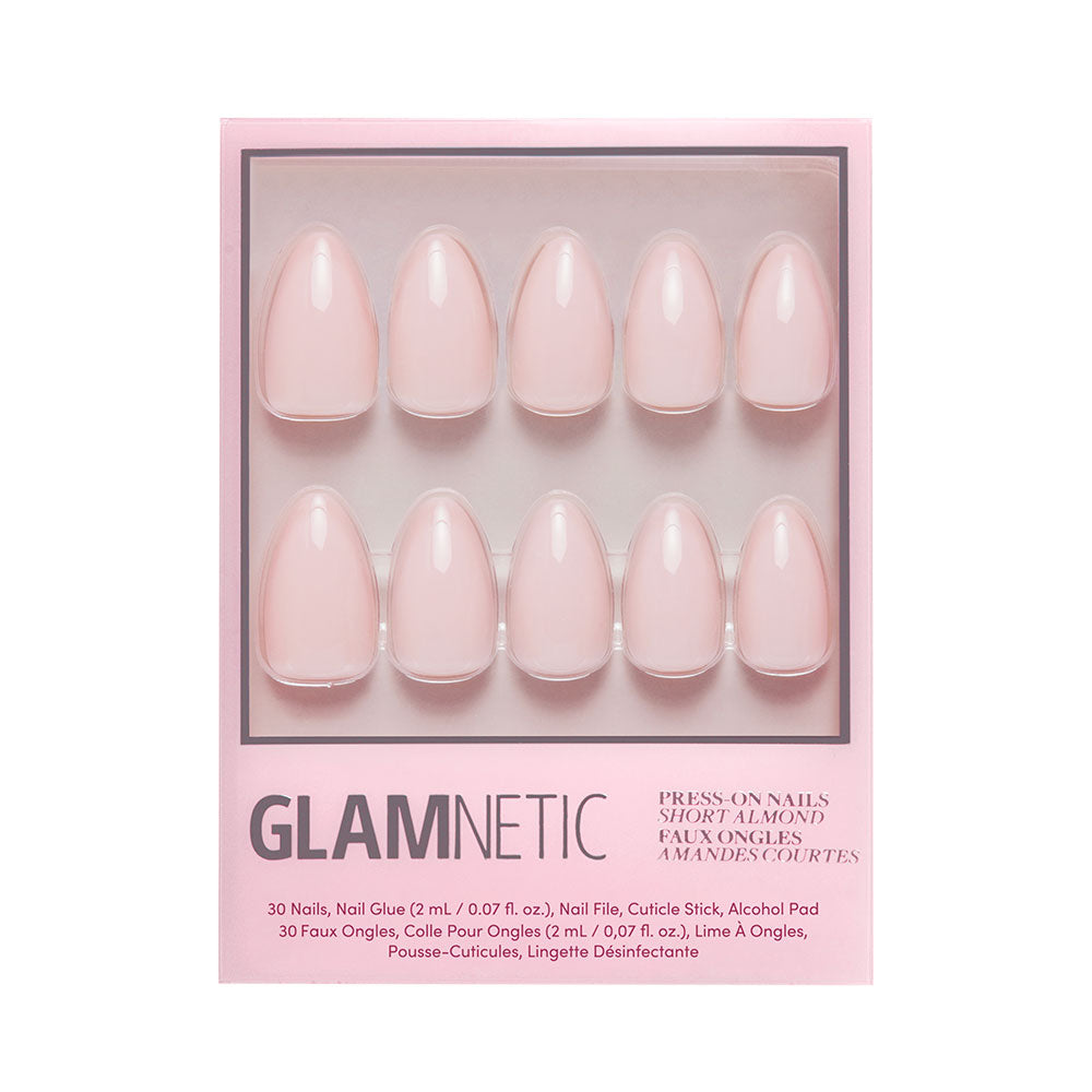 The glamnetic Ballet Pink press-on nail set includes 10 short almond-shaped, glossy nails plus nail glue, a cuticle stick, an alcohol pad, and a disinfectant wipe. - Product image