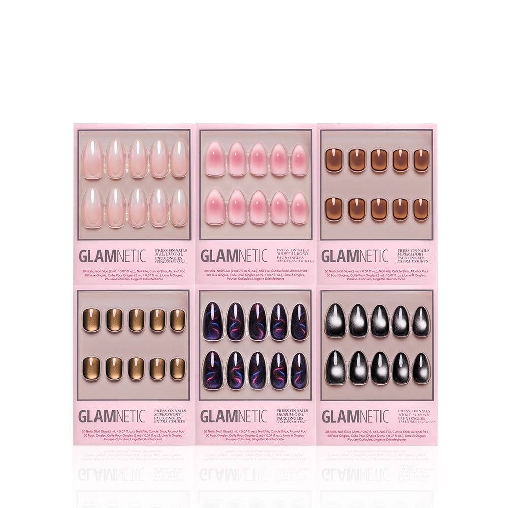 Six boxes of glamnetic Bare Gems press-on nails are arranged in two rows, showcasing pink, brown, gold, black, and multi-colored minimalist designs from the Sparkling Gems collection—ideal for fans of chic manis.
