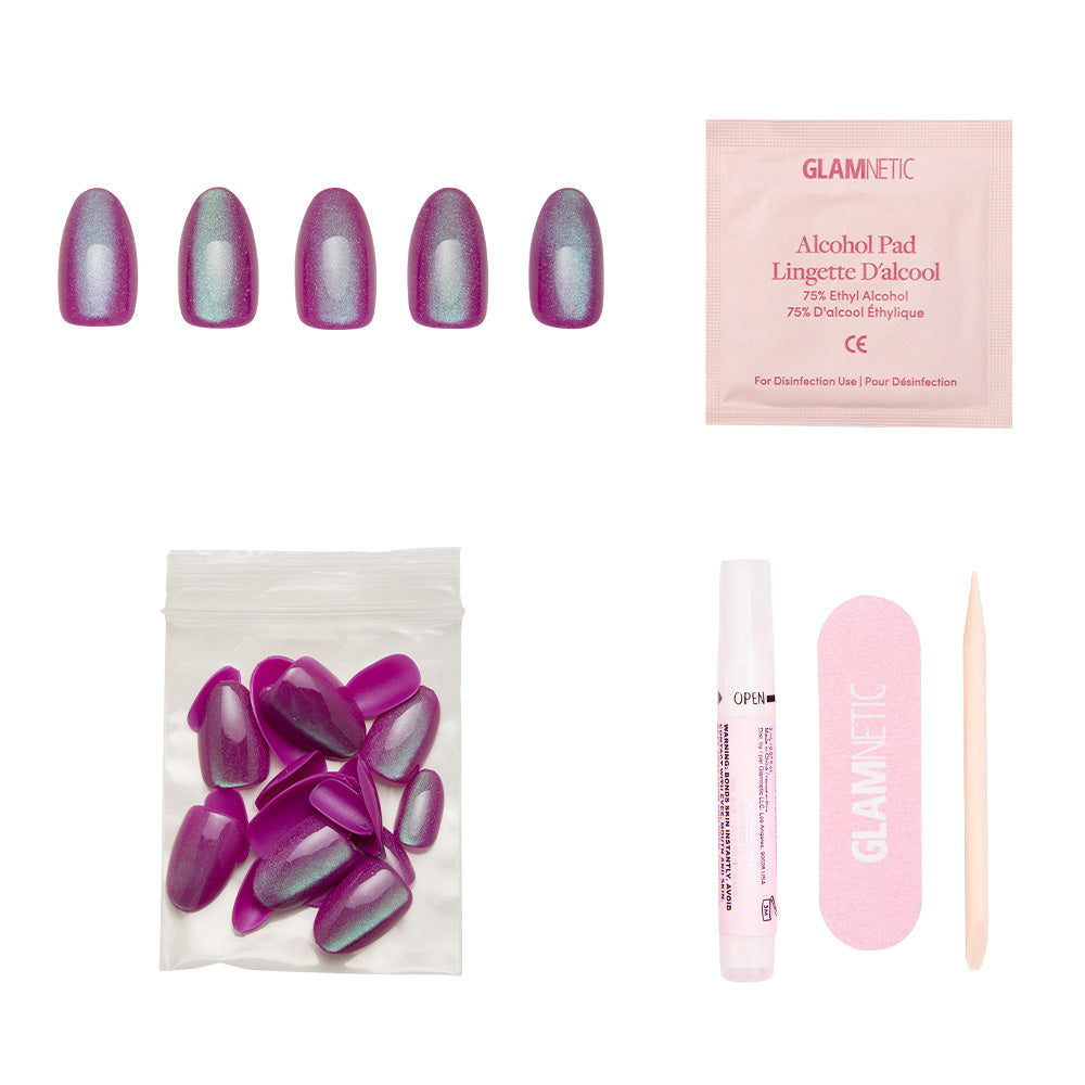 The glamnetic Berry Fizz set includes five purple shimmering velvet metallic nails, extra nails, an alcohol pad, nail glue, a pink nail file, and a wooden cuticle stick, all displayed on a white background. - Product image