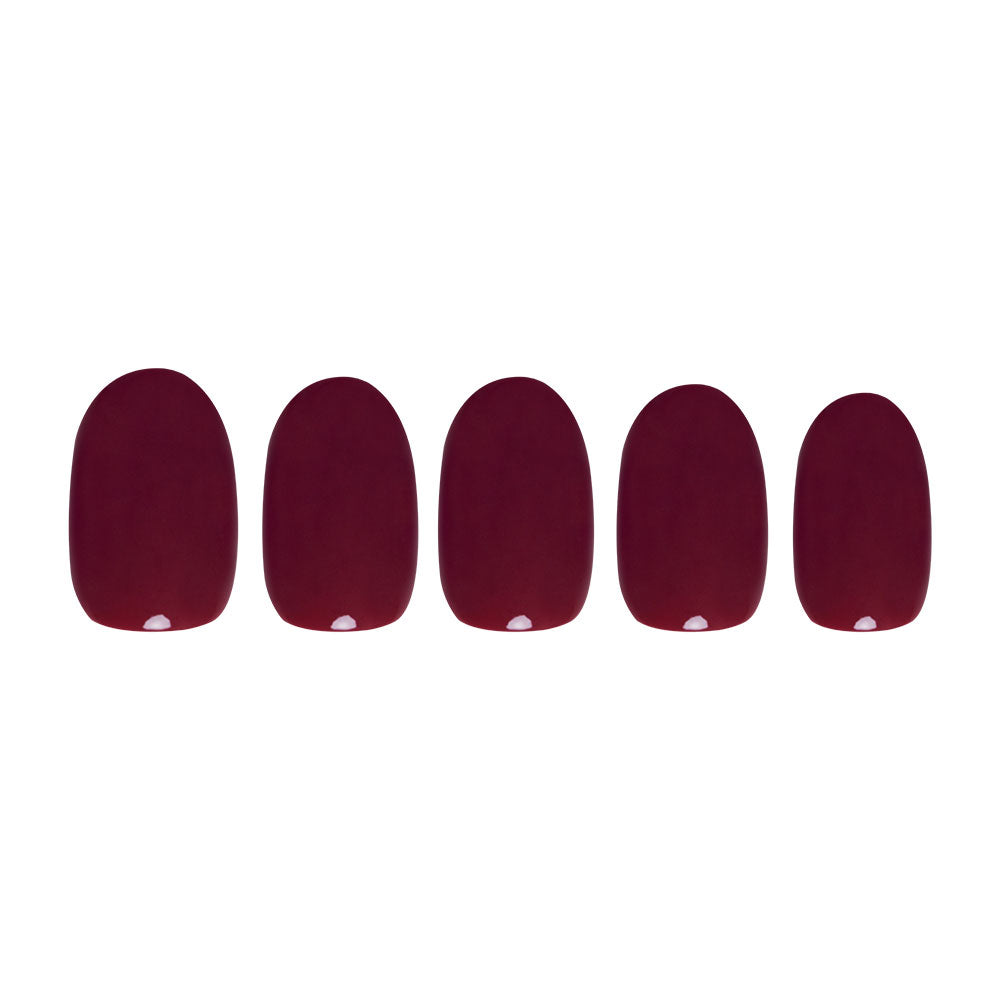 Five glossy dark burgundy press-on nails from glamnetic’s Berry Maroon set are arranged in a row on a white background, adding rich Fall Forest vibes to your manicure. - Product image