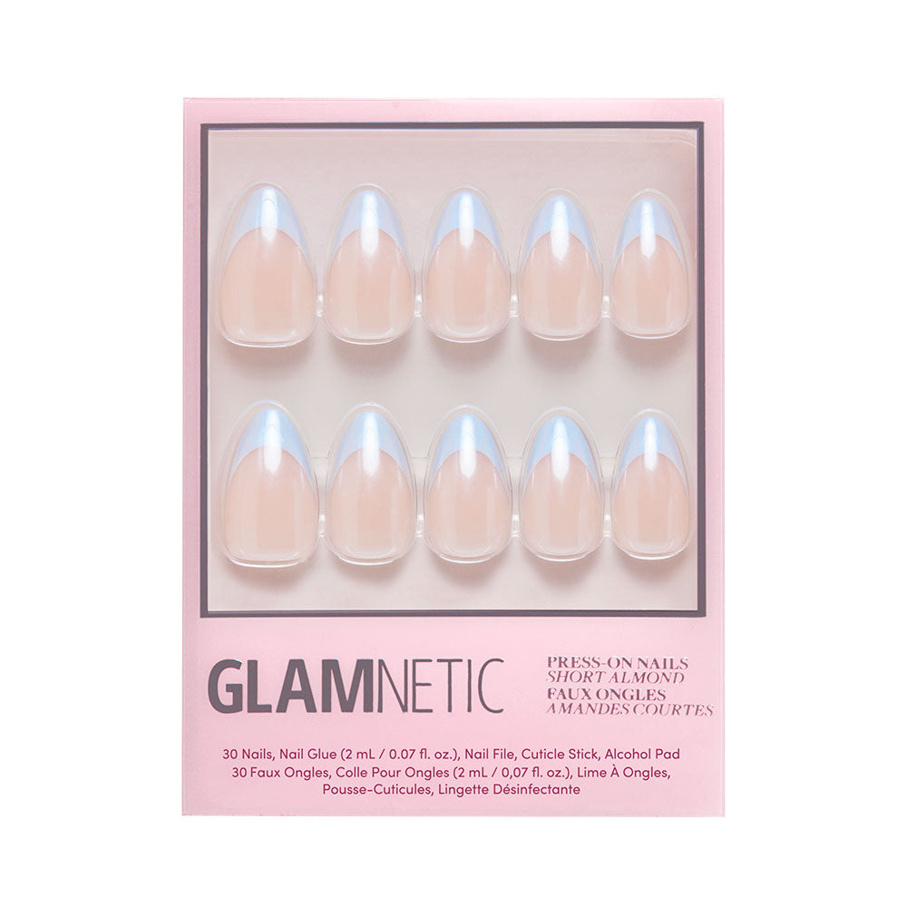 The glamnetic Blueberry Icing set includes 30 short, almond-shaped press-on nails in a natural nude with a glazed finish, plus nail glue and manicure tools—all in pink packaging. Perfect for achieving the Blueberry Icing look. - Product image
