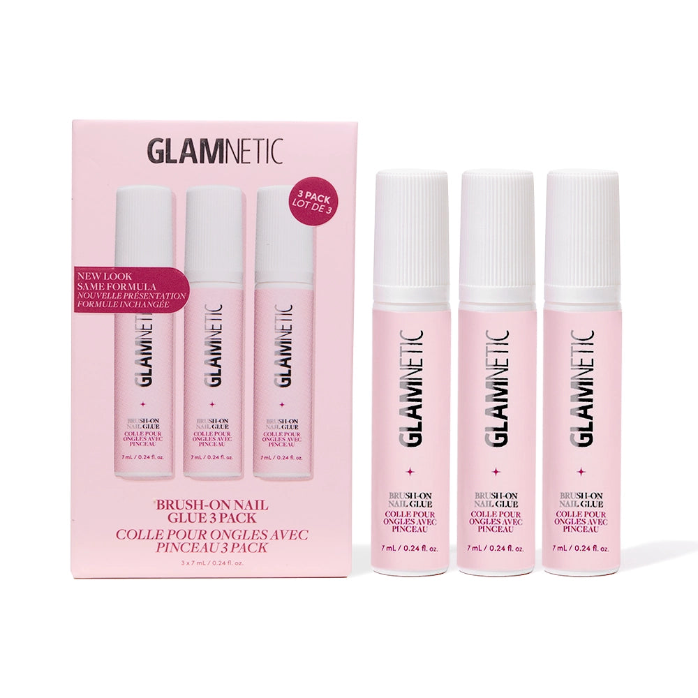A glamnetic Glue Trio box in pink is displayed alongside three individual upright pink bottles of nail glue, all set against a white background—ideal for effortlessly applying your favorite press-on nails and achieving a salon-quality manicure at home.