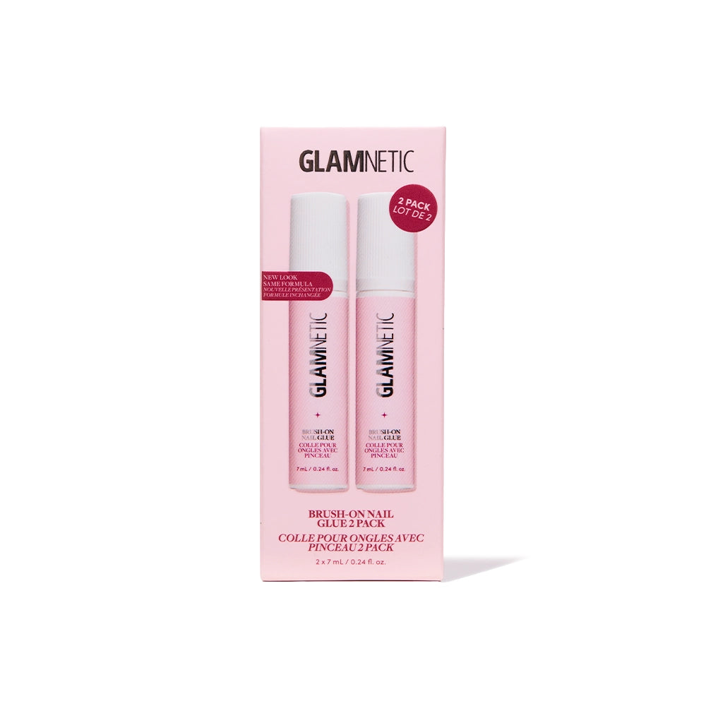 A light gray background showcases a pink box labeled glamnetic Glue Duo, featuring two bottles of Brush-On Nail Glue for achieving salon-quality nails at home. The packaging displays product information in both English and French, with a "2 pack" label clearly visible.