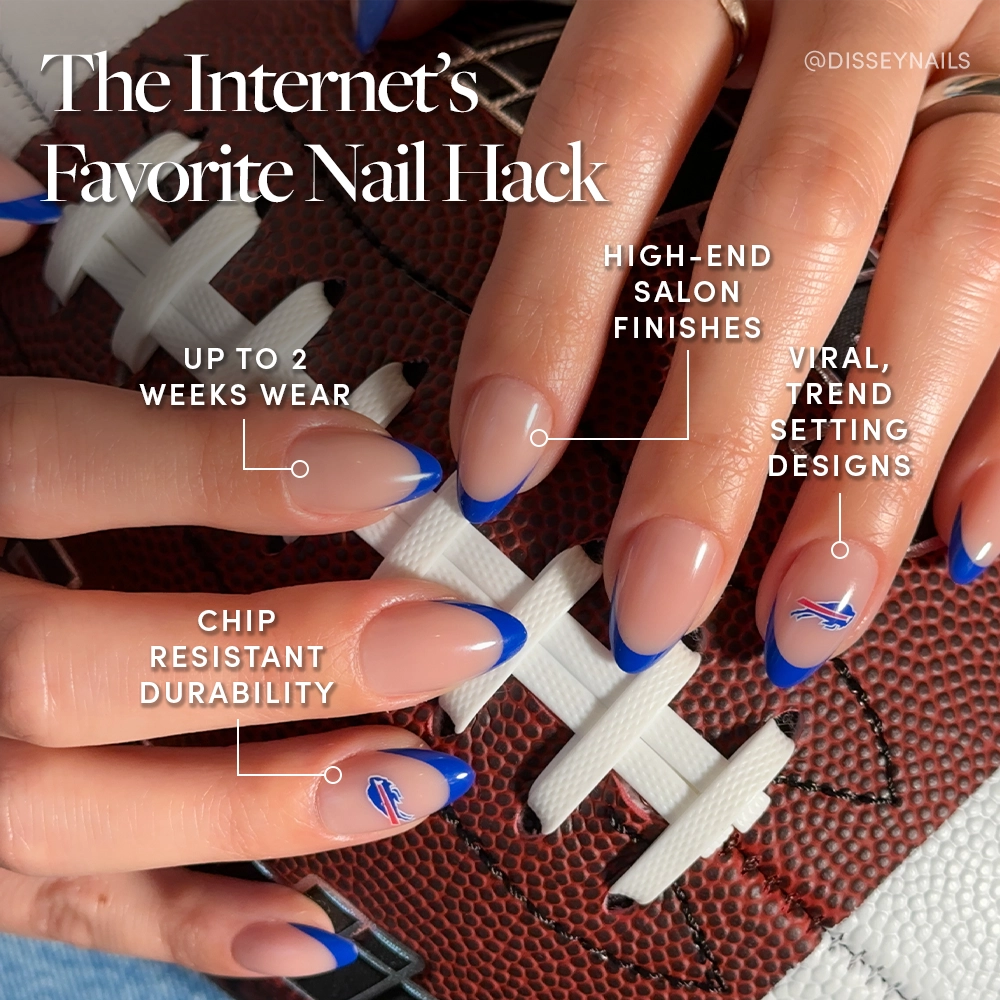 A close-up of manicured hands shows glamnetic’s Buffalo Bills Press-On Nail Set with blue French tips and team logos, holding a football. Text highlights salon finish, trendy design, durability, and up to 2 weeks of wear. - Product image