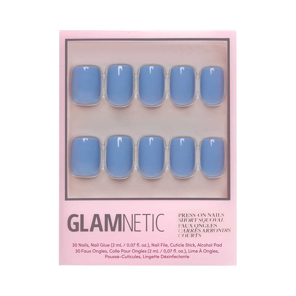 The glamnetic Cashmere Blue Nail Set includes ten short, squoval, solid blue vegan and cruelty-free press-on nails, displayed in a pink box for easy, chic style. - Product image