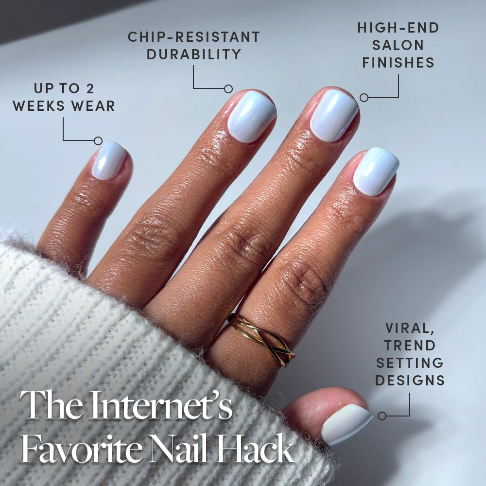 A hand with neatly manicured, light blue Clear Skies press-on nails by glamnetic is shown. Text highlights chip-resistant durability, salon-quality finish, up to 2 weeks wear, and trendsetting designs. The Internet’s Favorite Nail Hack appears below. - Product image