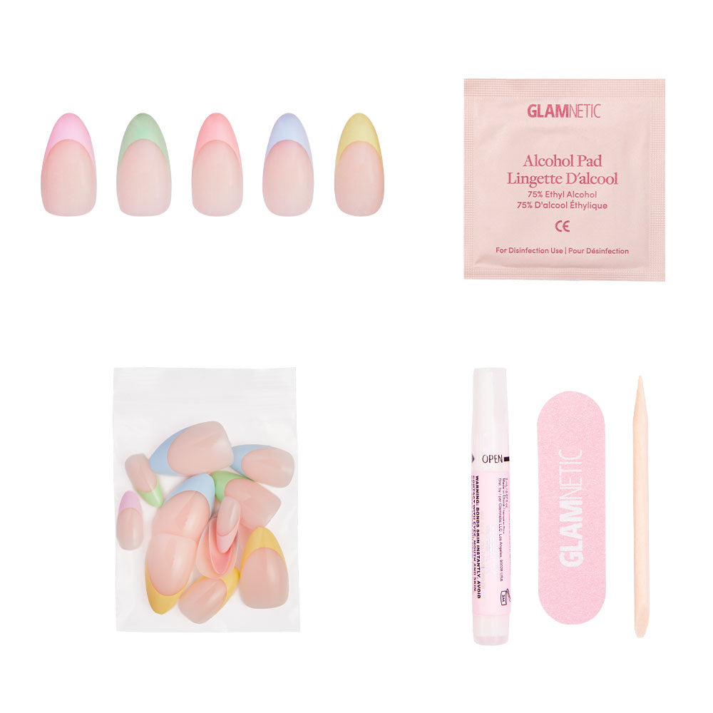 The glamnetic Confetti Press-On Nails kit features almond-shaped pastel tips, extra nails, an alcohol pad, nail glue pen, pink file, and cuticle stick—all displayed on a white background. - Product image