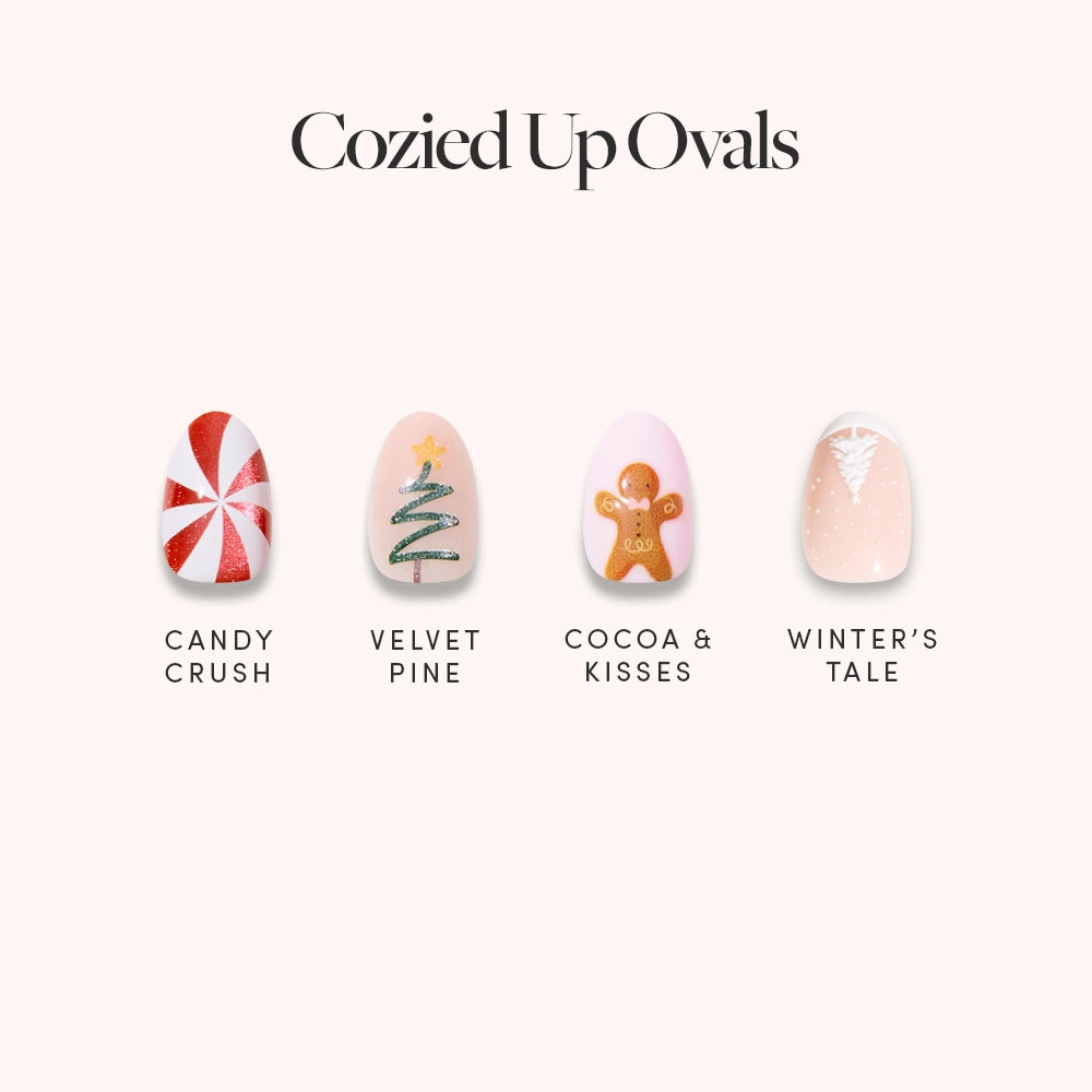 Cozied Up Ovals by glamnetic features four festive short oval nails: peppermint swirl, Christmas tree with gold star, gingerbread person, and pale pink with snow accents—ideal for a cheerful winter manicure.
