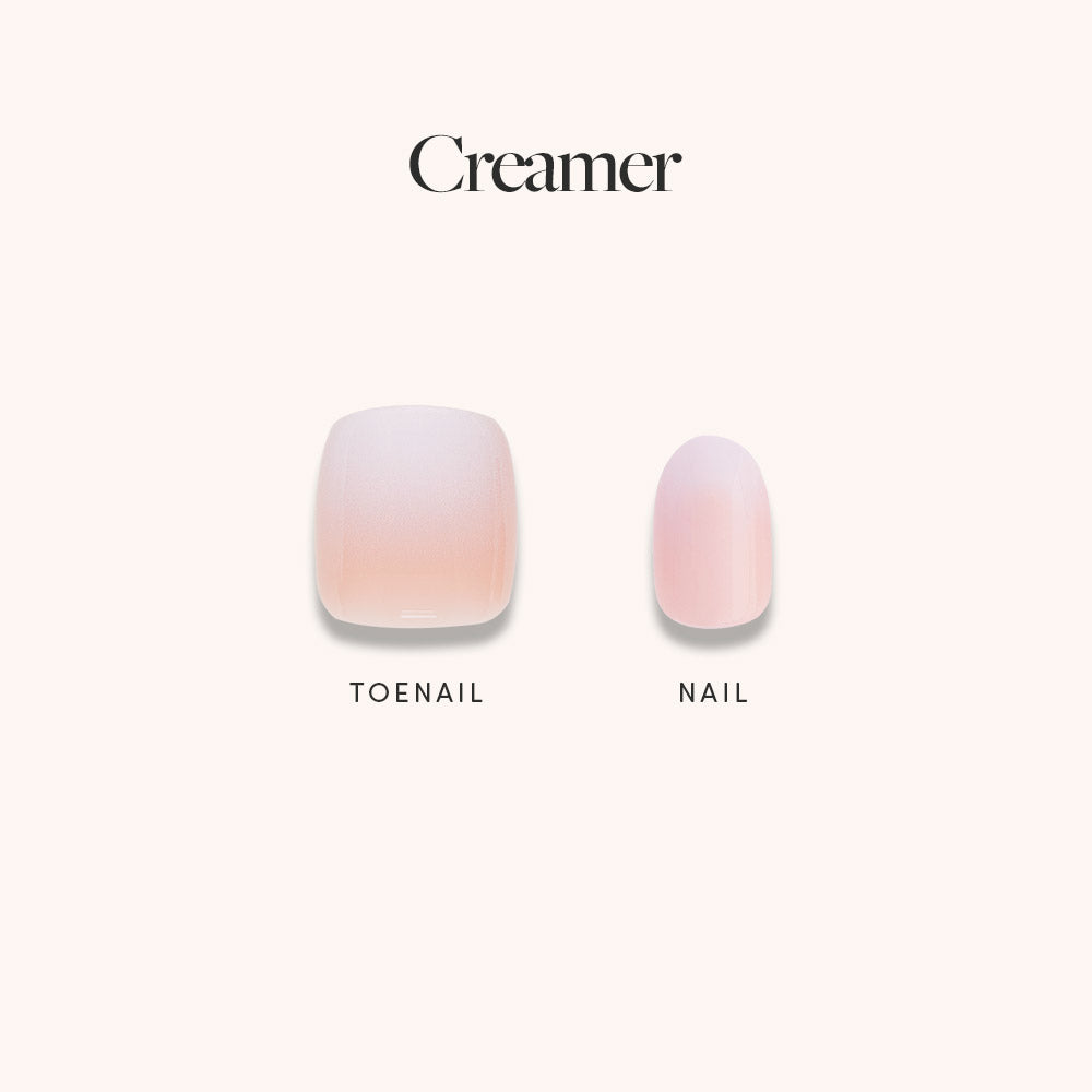Image showing two artificial nails from glamnetics Creamer Mani Pedi: a wider, square toenail and a narrower, oval nail. Both have a glossy, soft pink finish. - Product image