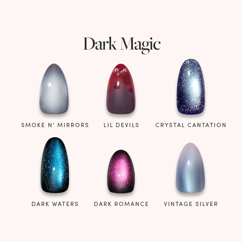 Six press-on nails in gradient and glitter styles labeled: Smoke N Mirrors (gray), Lil Devils (red), Crystal Cantation (blue glitter), Dark Waters (teal glitter), Dark Romance (purple glitter), Vintage Silver (silver-gray). Enjoy salon-quality durability and a velvet finish for a flawless, standout look. - Product image