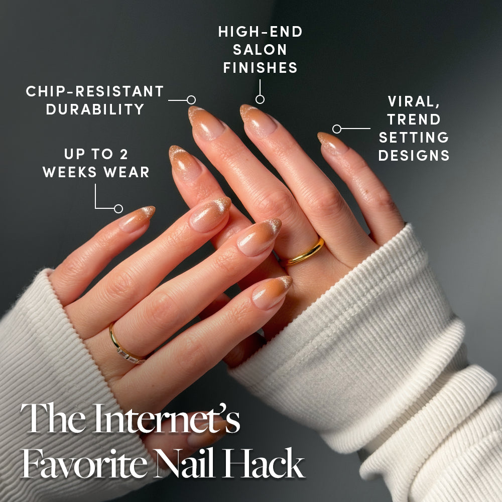 Two hands with manicured, short almond press-ons in a glossy nude gradient with a subtle velvet cat-eye effect. EARNED NOT GIVEN by glamnetic offers chip-resistant durability, up to 2 weeks wear, salon-quality finish, and viral trendsetting design. - Product image