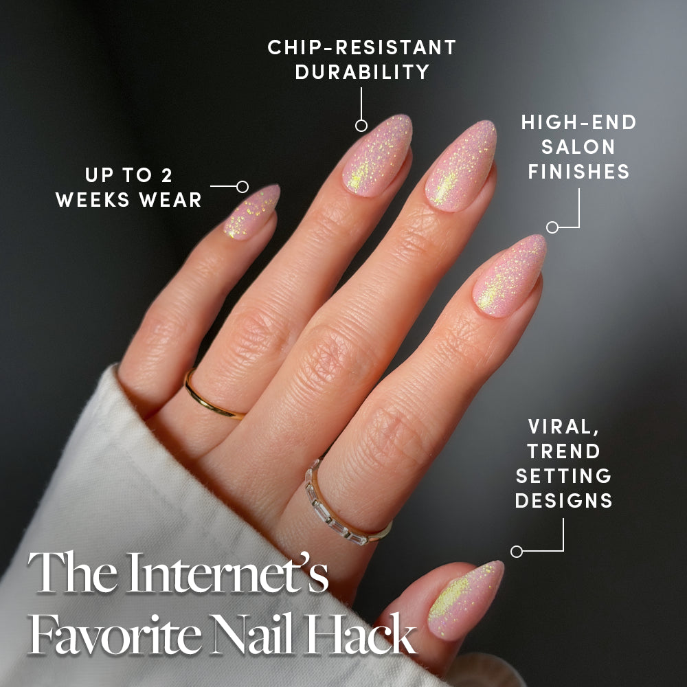 A hand with long, almond-shaped, sparkly pink holographic shimmer nails—glamnetic's FAIRY FLEXX—shows off chip-resistant durability, salon-quality finish, up to 2 weeks wear, and trendy design. Caption: The Internet's Favorite Nail Hack. - Product image