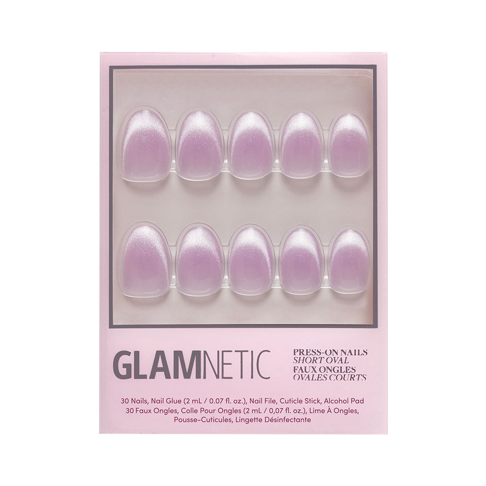 The glamnetic Fairy Dust press-on nail set features a short oval shape and light pink shimmery velvet metallic finish. Each box includes 30 nails, nail glue, a file, a cuticle stick, and an alcohol pad. - Product image