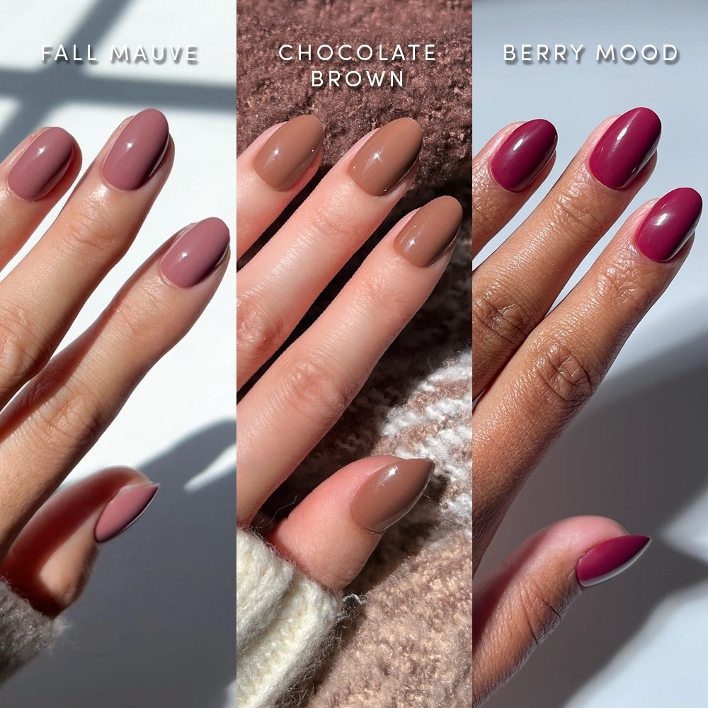 Three hands display manicured nails in different shades: Fall Mauve on the left, Chocolate Brown in the center, and Berry Mood on the right, each finished with high-shine gloss under natural lighting. Featuring the Sweater Weather Ovals by glamnetic, these short oval press-on nails deliver both durable wear and effortless style. - Product image