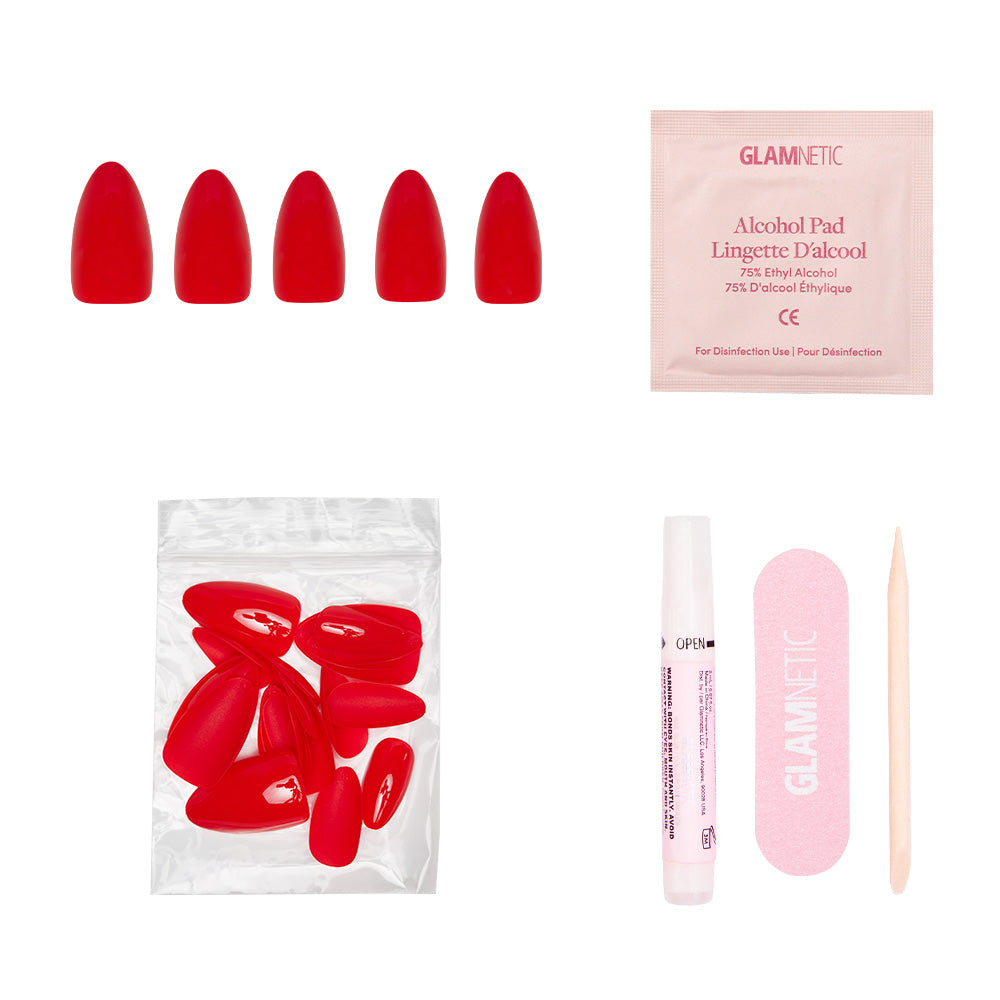 The glamnetic Fiery Red press-on nail set includes nails, an alcohol pad, extra nails, nail glue, a pink file, and a cuticle stick—everything you need for bold summer nails. - Product image
