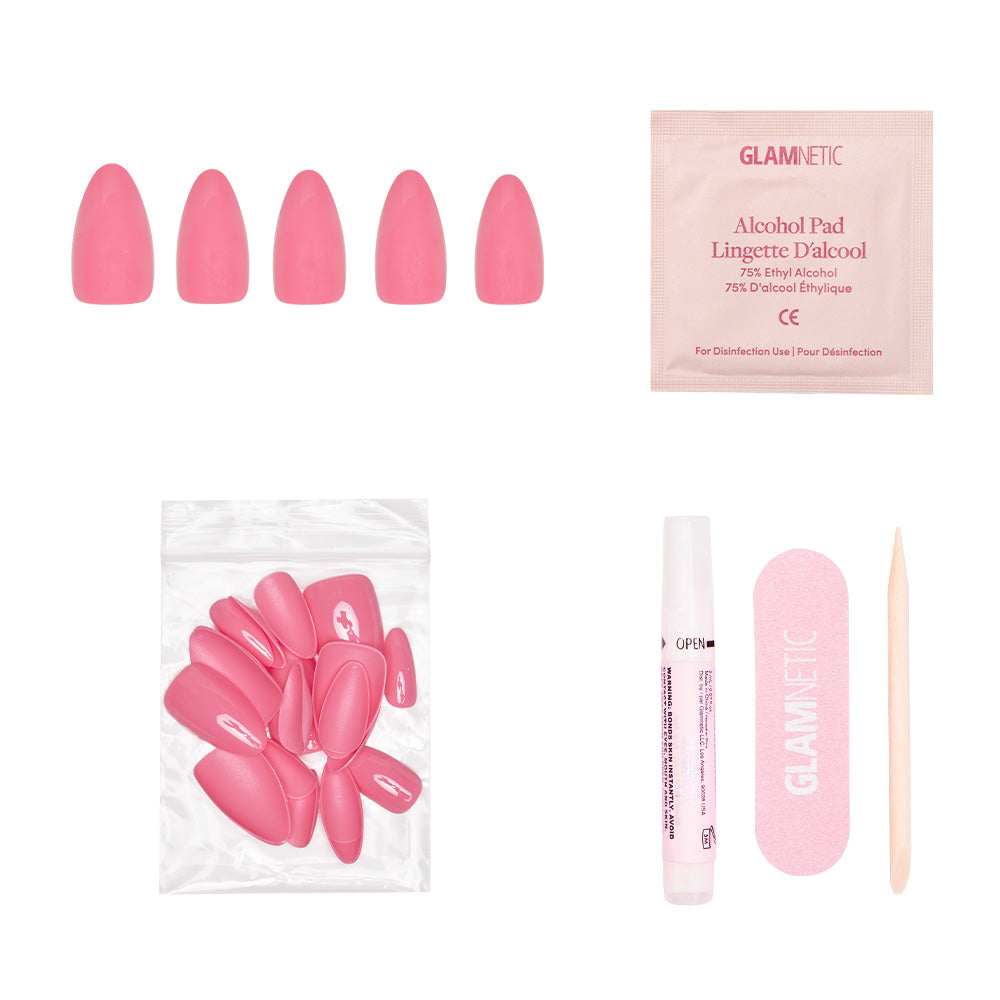 The glamnetic Flamingo Pink set includes short almond nails, extra nails, nail glue, an alcohol pad, a pink nail file, and a wooden cuticle stick—ideal for your summer adventures. - Product image