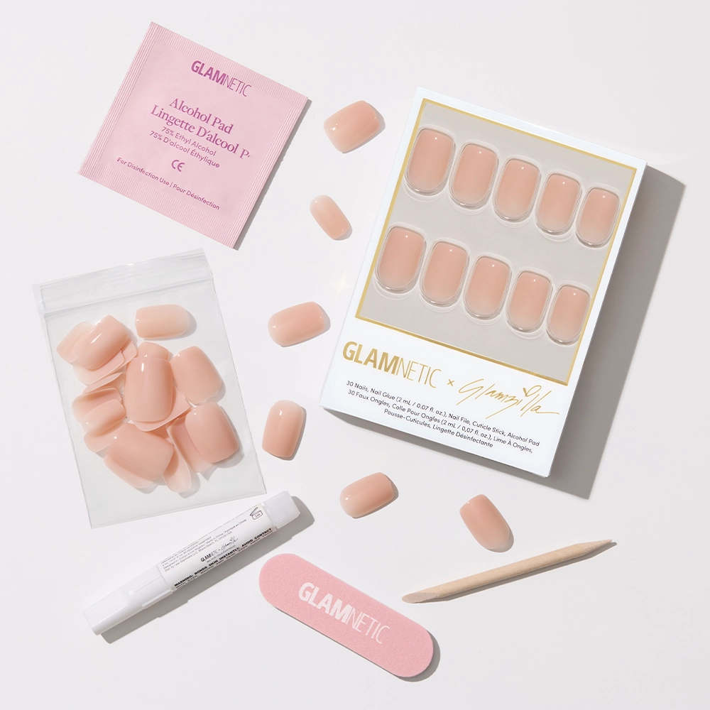 Glamnetic press-on nails with packaging and application tools on a white background - Product image