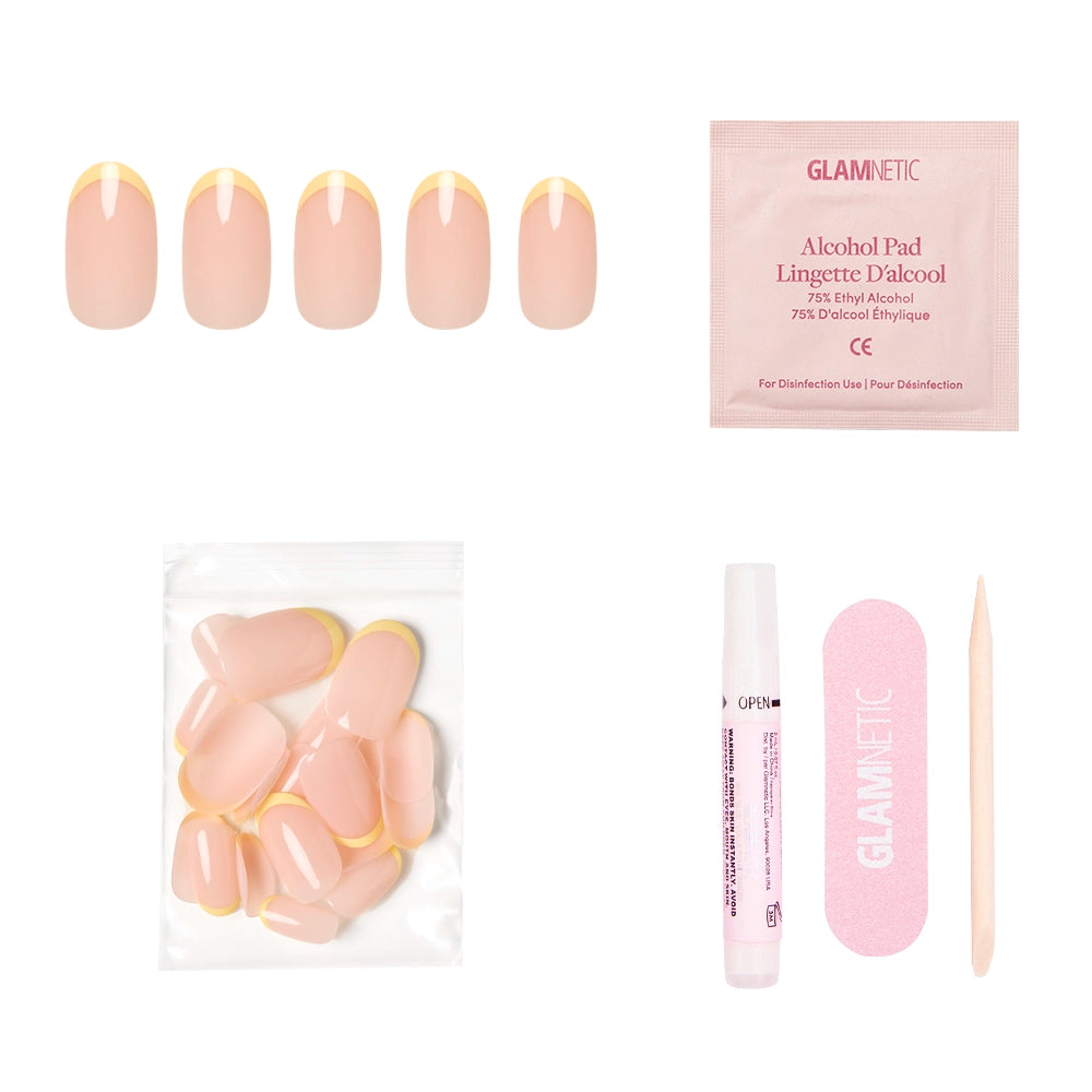 The glamnetic French Butter Press-On Nail Set includes five nude nails with pastel yellow French tips, extra nails, an alcohol pad, nail glue, a pink file, and a wooden cuticle stick for salon-quality durability. - Product image
