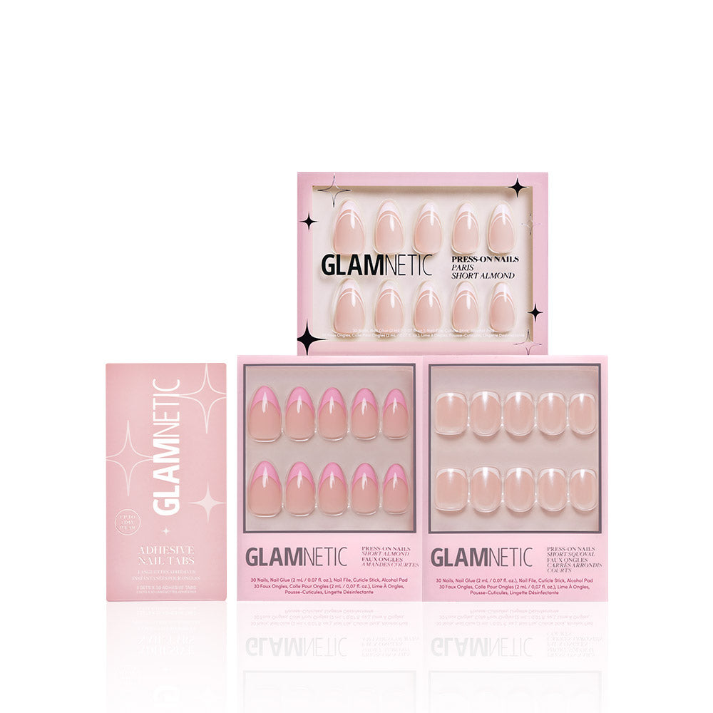 Three pink boxes of glamnetic French Tip Faves press-on nails are displayed upright, showing glossy nude and classic French tip styles for a salon-quality look, all set against a white background. - Product image