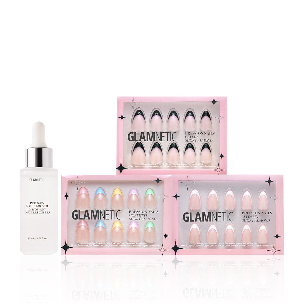 The glamnetic Frenchie Bundle, featuring three pastel press-on nail sets (including Caviar Confetti) and a bottle of Brush On Nail Glue, is shown in chic pink packaging. - Product image