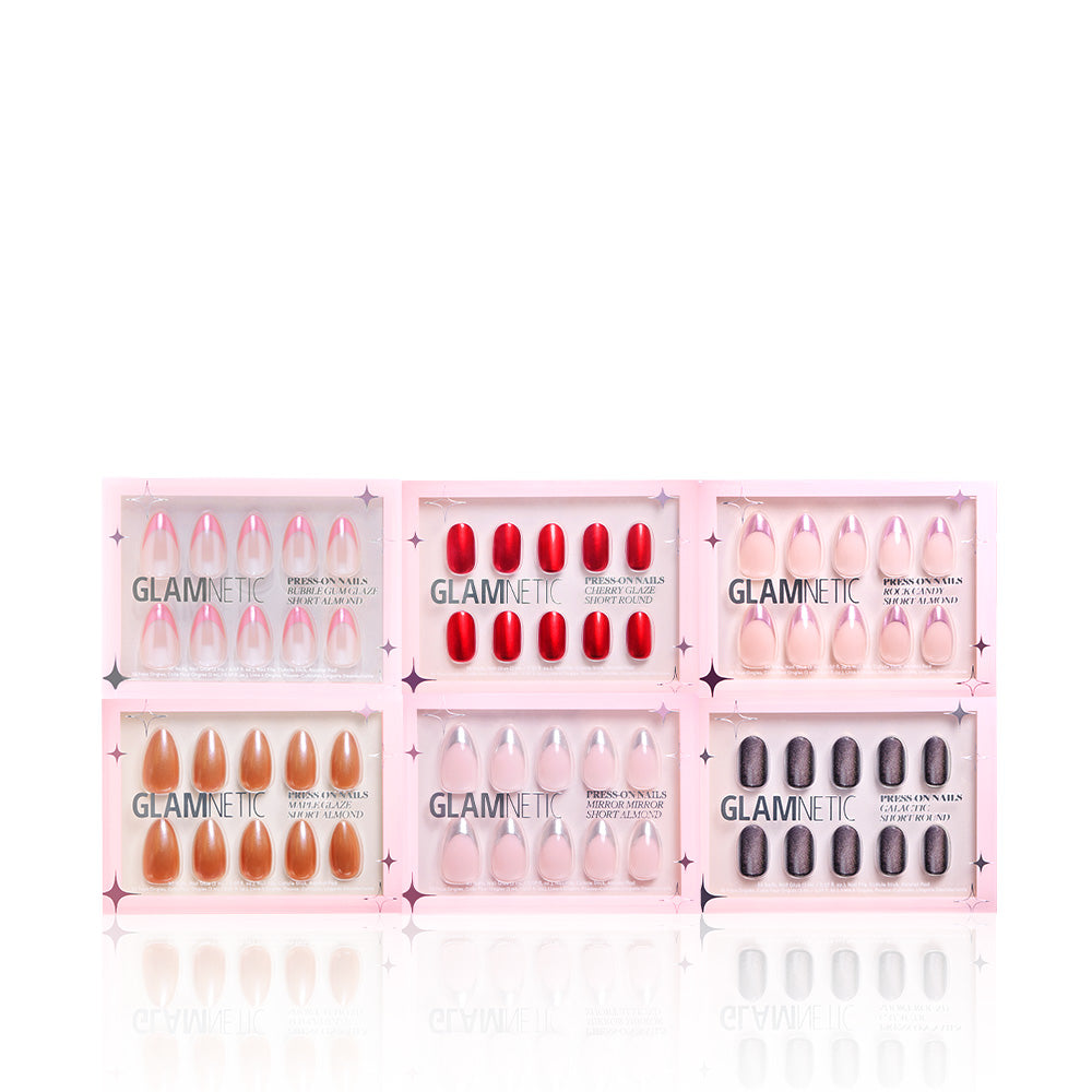 Six boxes of glamnetic’s Glossy Collection Almond Style Nails in nude, red, light pink, and dark purple feature a glazed finish. Vegan and cruelty free. Displayed in two rows of three on a white background. - Product image