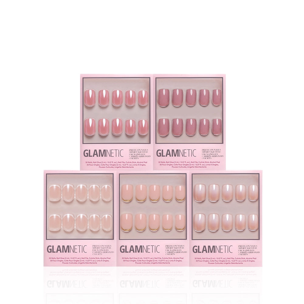 Five boxes of glamnetic Gold Star Squovals salon-quality press-on nails in various shades of nude and pink, arranged in two rows on a white background. Each box displays a full set of short squoval press-on nails for a flawless at-home manicure. - Product image