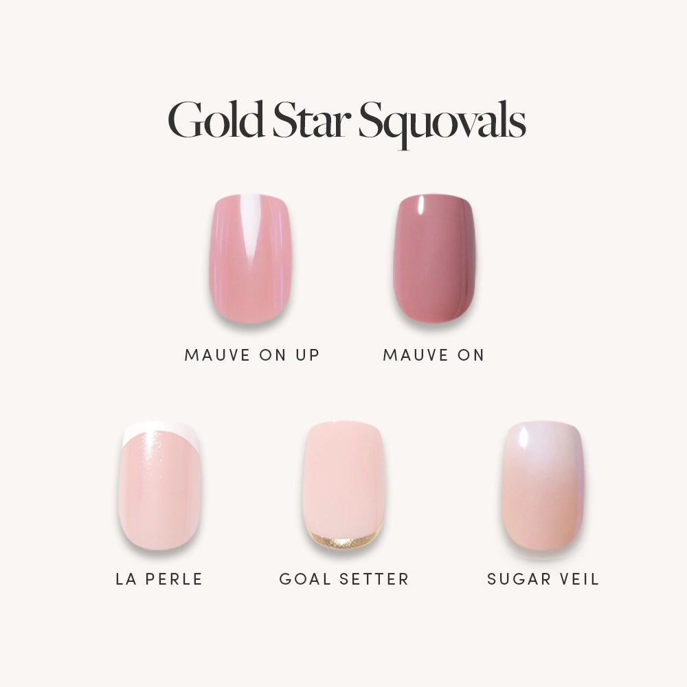 Five squoval-shaped press-on nails from glamnetic's Gold Star Squovals collection—featuring the shades Mauve On Up, Mauve On, La Perle, Goal Setter, and Sugar Veil—are displayed on a white background with each name labeled beneath its respective nail. These salon-quality nails provide a chic and effortless look. Text above reads “Gold Star Squovals.”. - Product image