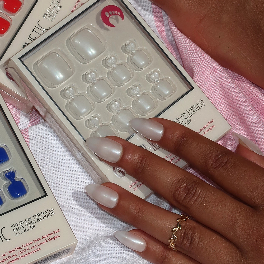 Nail art kit with press-on nails and a hand with press-on nails. - Product image