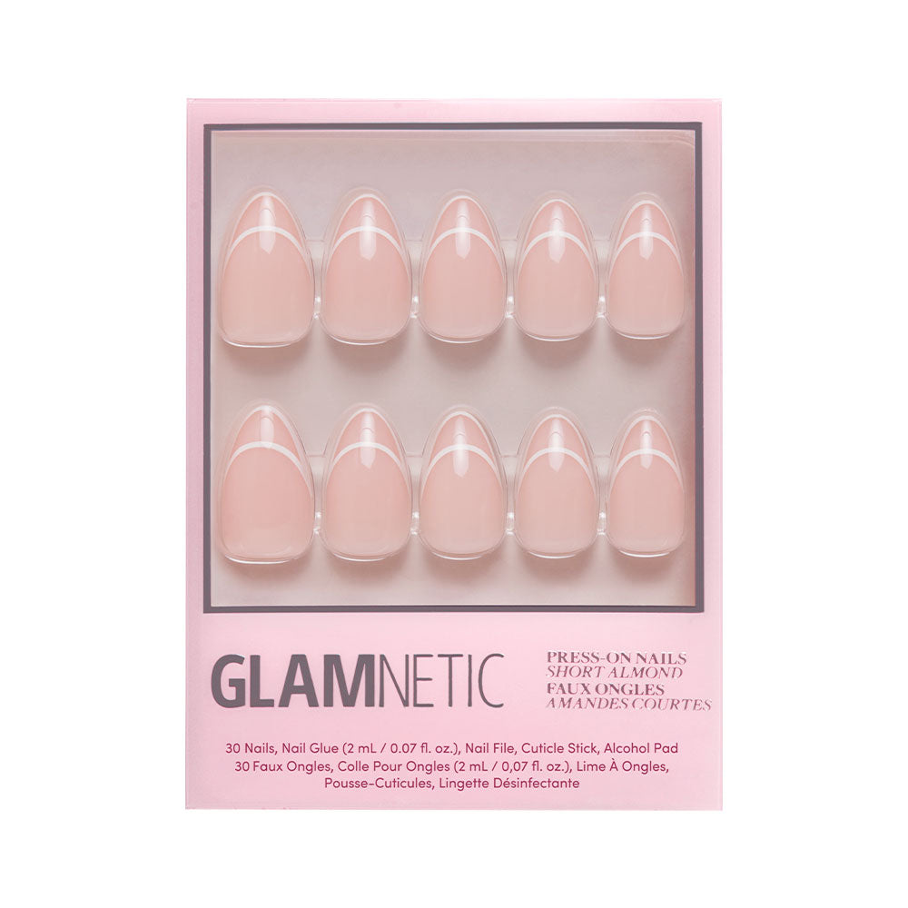 A box of glamnetic Heavenly press-on nails in a short almond shape with light nude pink, French mani style. Vegan & cruelty-free. Includes 10 displayed nails, nail glue, file, cuticle stick, and alcohol pad. - Product image