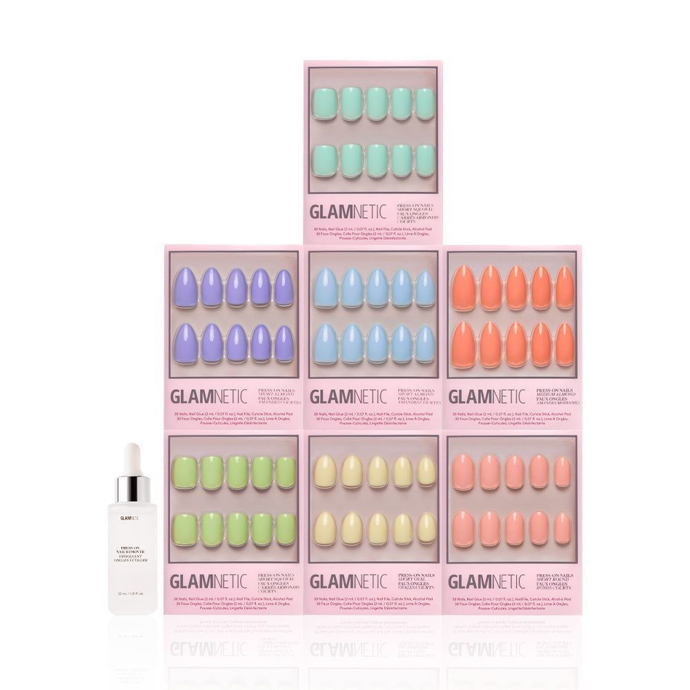 Seven glossy pastel solid shades from the Glamnetic Hello Spring Collection are arranged in a pyramid, with each press-on nail set and a white cuticle oil dropper bottle displayed on a white background. - Product image