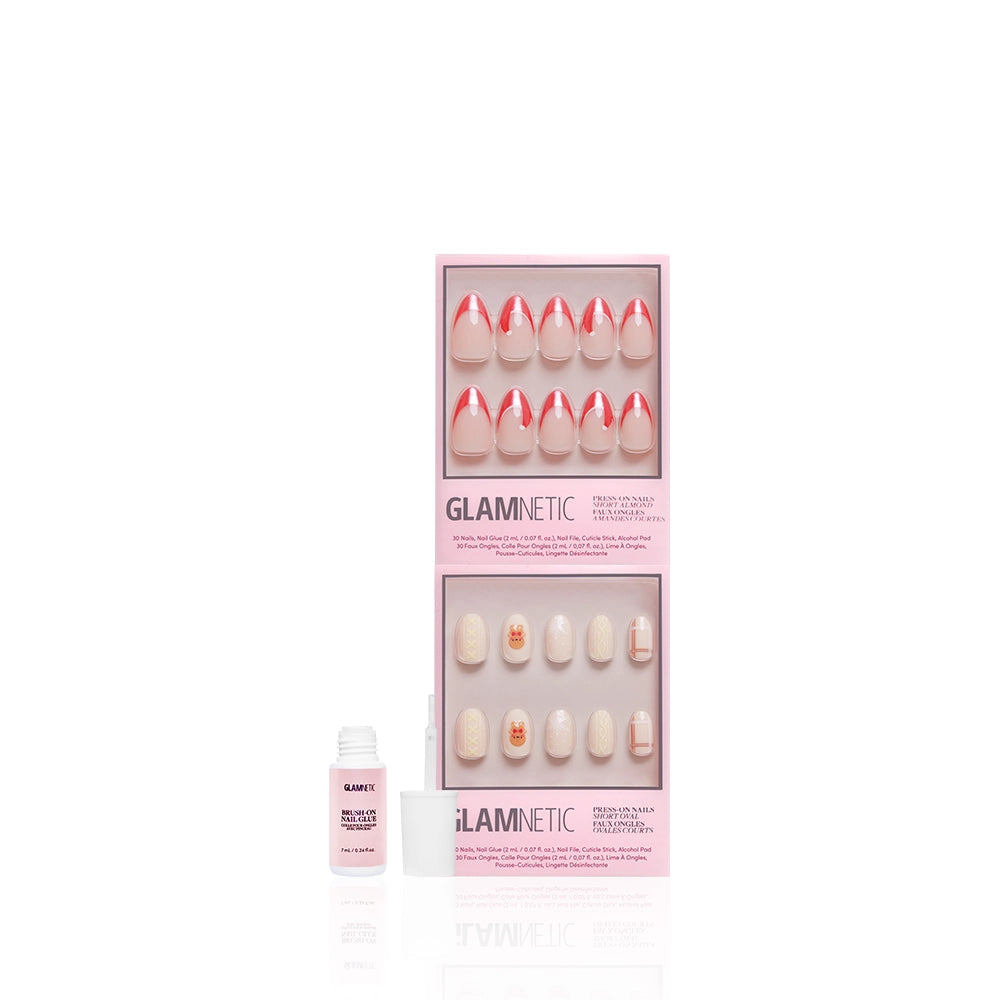 A glamnetic Holiday Duo nail set is displayed in pink packaging. The top row shows pink French tip nails, while the bottom row has nude nails with pink accents. Nail glue and an applicator are included on the left. - Product image