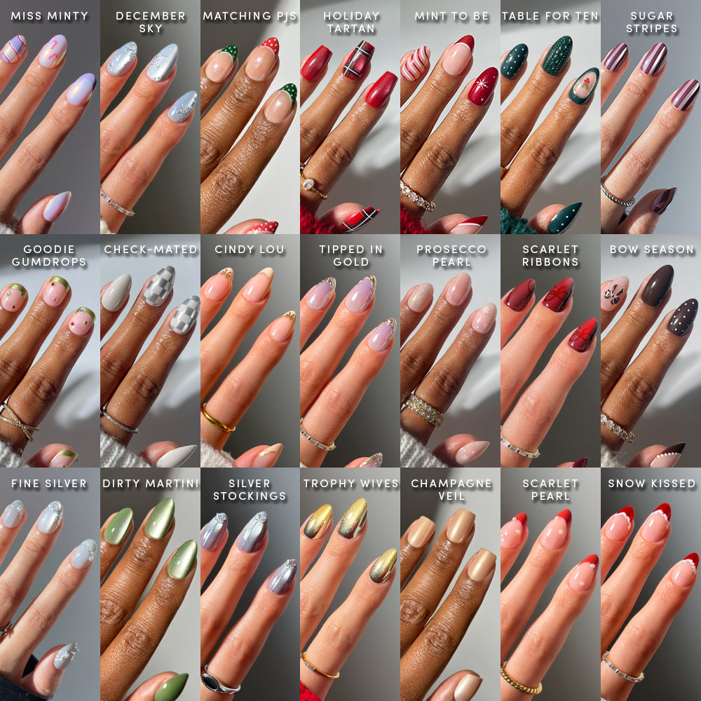 A grid of 25 manicured hands, each showcasing a unique nail art design from the “Holiday In The City” collection by glamnetic and labeled with its name, displays an array of vibrant colors and festive patterns—including stripes, glitter, metallic accents, and holiday motifs—all achieved with salon-quality press-on nails for a flawless finish.