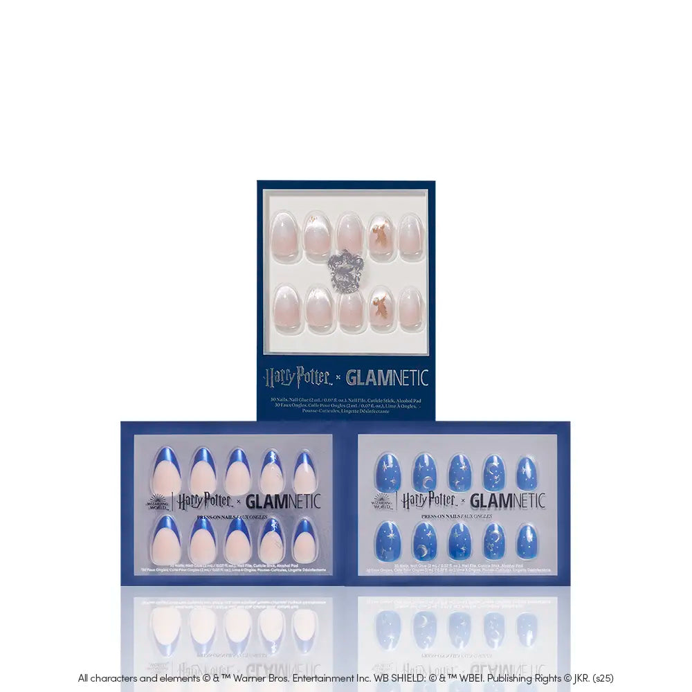 Three sets of glamnetic House Ravenclaw™ press-on nails in blue and pink are shown in rectangular boxes, featuring magical-themed designs, including Luna Lovegood-inspired nails and themed logos on the packaging. - Product image