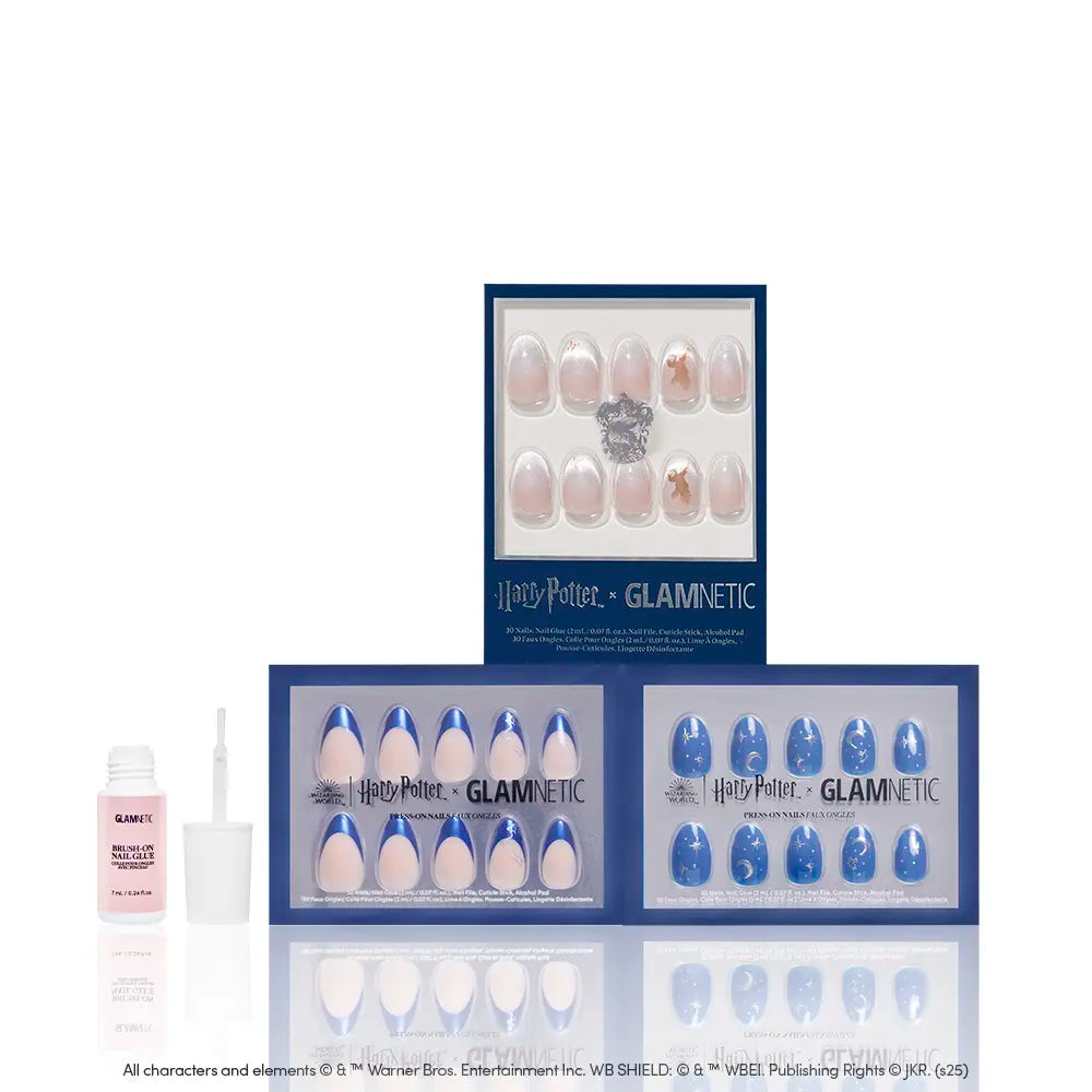 Three glamnetic House Ravenclaw™ press-on nail sets—two blue, one pink—and a bottle of glue with applicator are shown arranged against a white background. - Product image