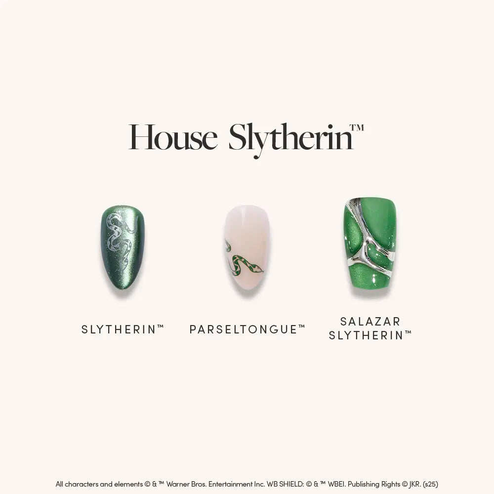 The House Slytherin™ nails by glamnetic feature a serpent design, sleek green lines, and abstract emerald green with silver patterns—perfect for adding a magical Harry Potter touch to your look.