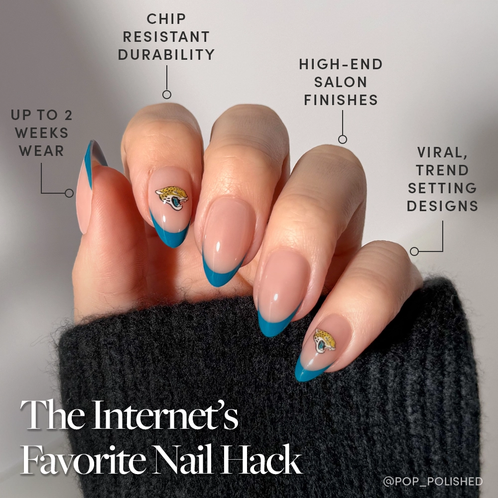 Show your team spirit with the glamnetic Jacksonville Jaguars Press-On Nail Set—long almond nails with blue French tips, eye design accents, chip resistance, trendy finishes, and up to two weeks of wear. Black sweater included. - Product image