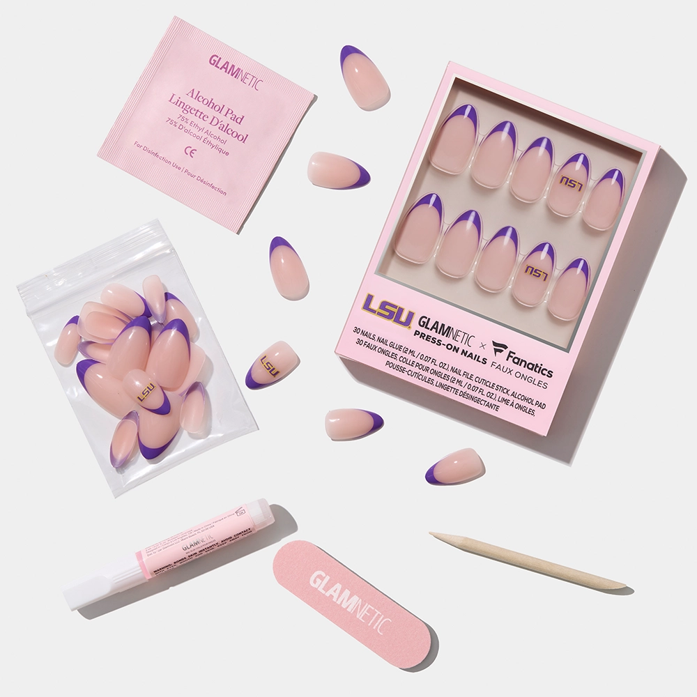 The glamnetic LSU Tigers Press-On Nail Set features purple French tip nails, a pink nail file, wooden cuticle stick, nail glue, alcohol pad, and extra nails, all displayed on a white background. - Product image