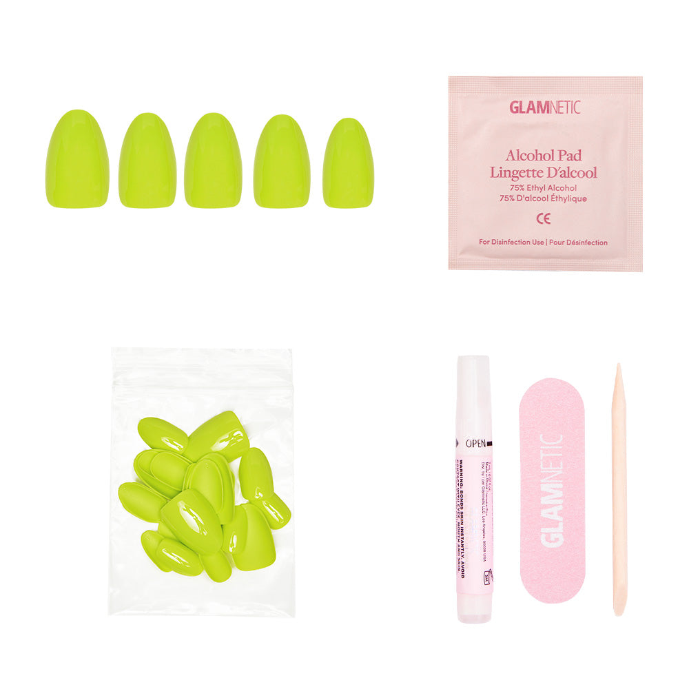 The glamnetic Lime Green set includes neon vegan nails (short oval), an alcohol pad, extra nails, a nail glue pen, a pink file, and a cuticle stick—all displayed on a white background. - Product image