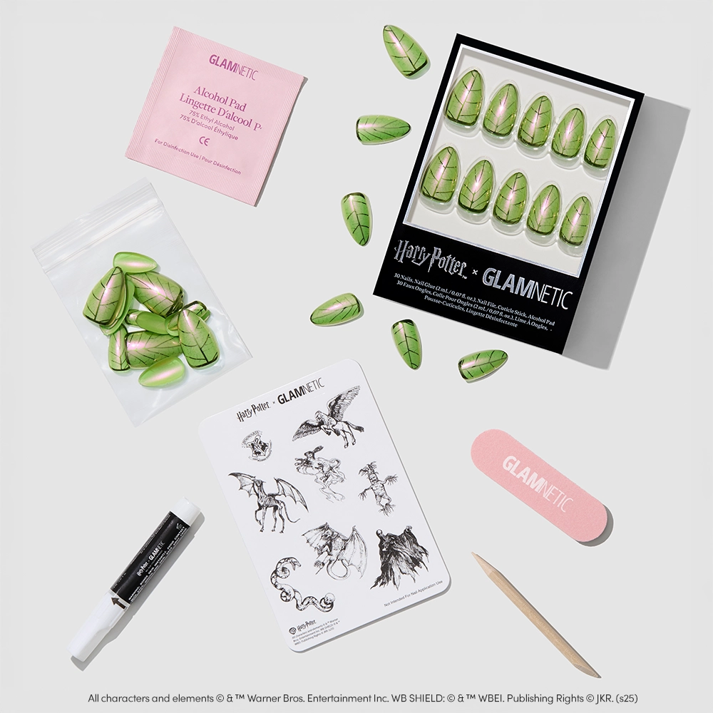Explore the glamnetic Mandrake Nail Set—featuring green nails inspired by magical plants. Includes nail glue, file, cuticle stick, alcohol pad, and art stickers—all arranged on a white surface. Limited edition!. - Product image