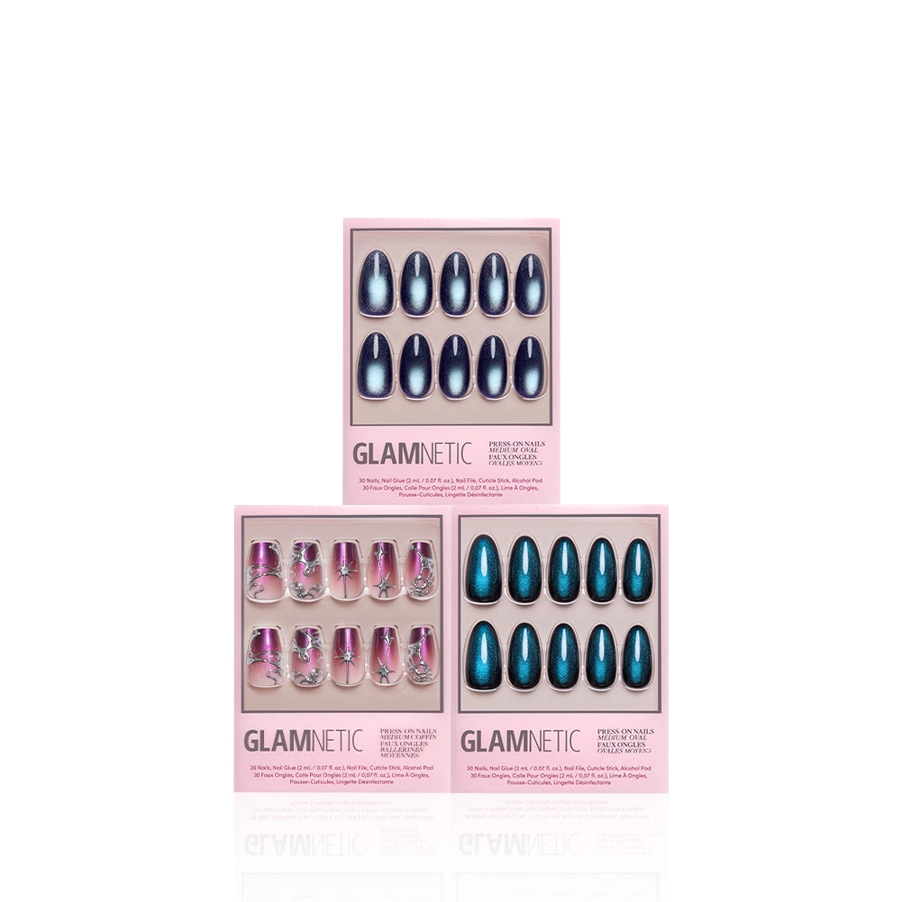 Three boxes of glamnetic Medium Magic salon-quality press-on nails are arranged in a triangle. The medium-length nails showcase blue chrome and pink marble designs, each presented in clear packaging with pale pink borders against a white background. - Product image