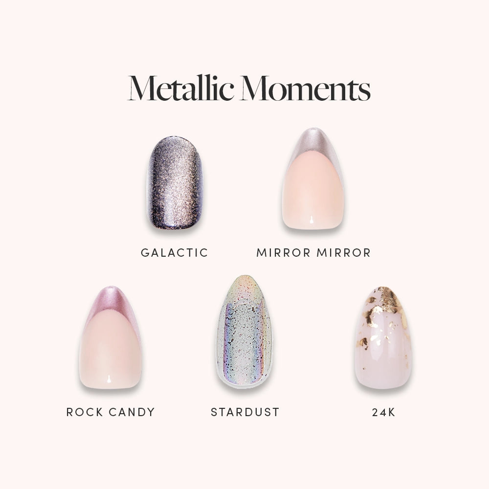 The glamnetic Metallic Moments Bundle includes five artificial nails: Galactic (shimmery silver), Mirror Mirror (chrome with silver tips), Rock Candy (pink with metallic tips), Stardust (holographic), and 24K (clear with gold flakes).