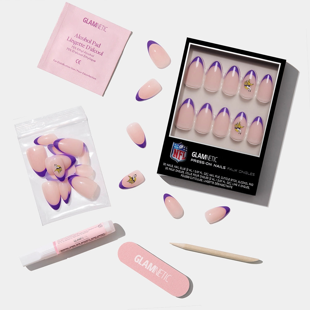 The glamnetic Minnesota Vikings Press-On Nail Set includes purple-tipped press-on nails, a mini file, cuticle stick, alcohol pad, adhesive, and extra nails—displayed on a white background. - Product image